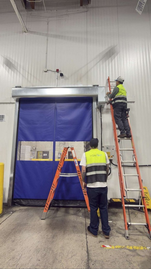 InSev Tech technicians mounting the new head assembly and drive in the active facility.